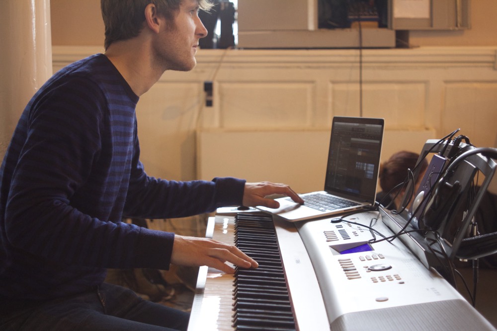 Dougie-Evans-Composing-Macbook-Piano